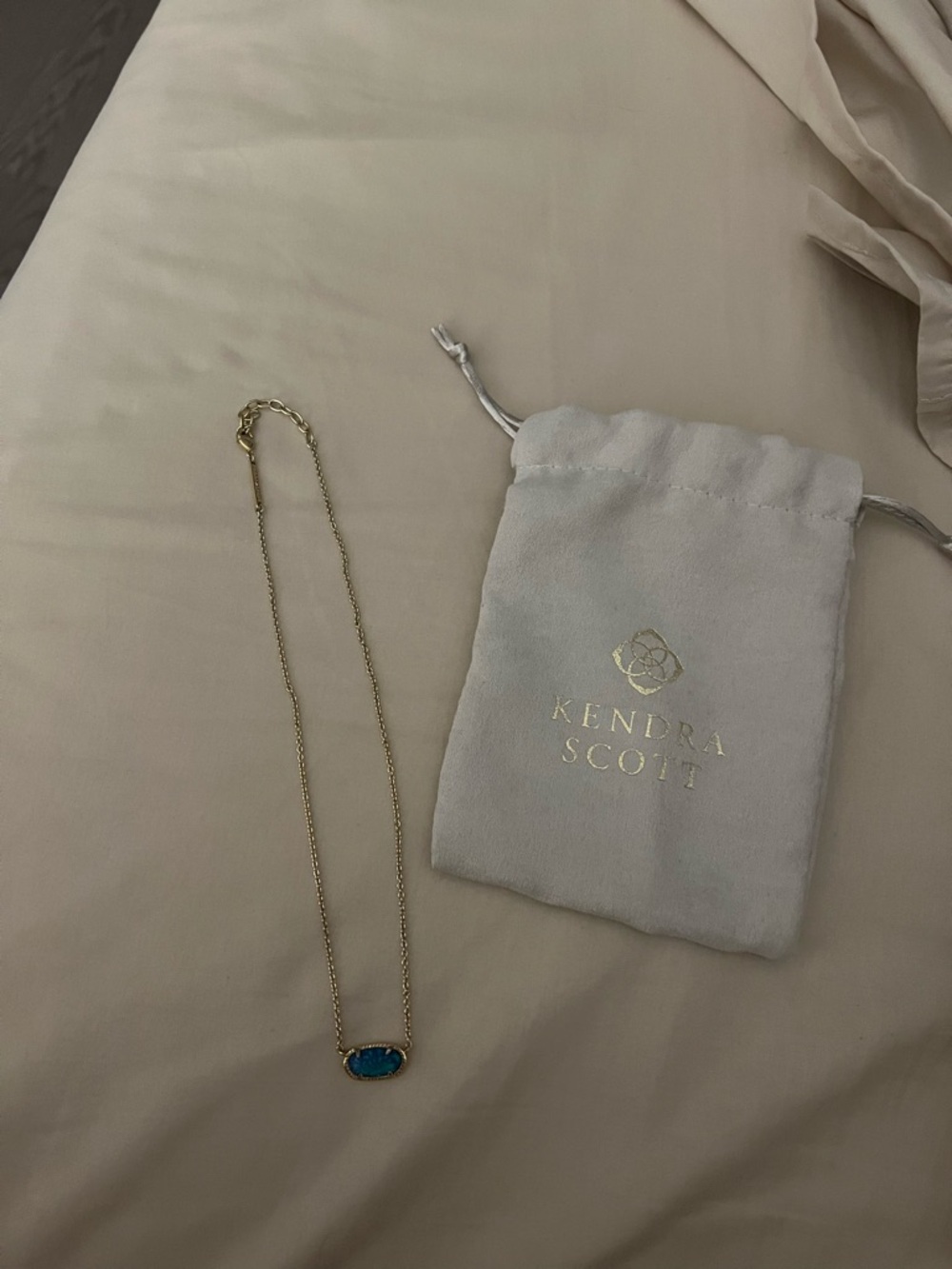 Kendra Scott Gold Necklace with Teal Oval Stone